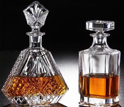 grind glass stoppers of whisky crystal bottles